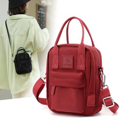 China Fashoion Cute Nylon Small Cross - Body Cell Phone Purse Wallet Bag With Shoulder Strap for sale