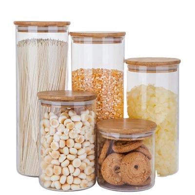 China Customized Borosilicate Stackable Wide Mouth Glass Storage Jar Wide Mouth Storage Jar With Glass Bamboo Lid for sale