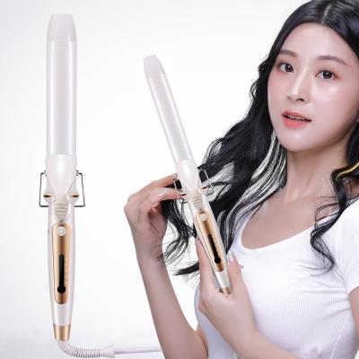 China Professional Adjustable Heat Settings Fashion Hair Curler Curling Iron Automatic Hair Roller Styling Hair Volume for sale