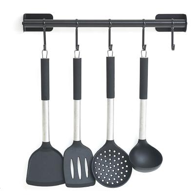 China Sustainable Cookware 4PC Kitchen Tools Non-Stick Spatula Shovel Silicone Cookware BPA Free Set With Anti Heat Silicone Handle for sale