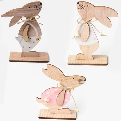 China New INS Spring Laser Cut Home Creative Wooden Easter Bunny Table Decoration Nordic Wood Crafts Decoration for sale