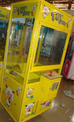 China Toy Story Claw Crane machine for sale yellow for sale