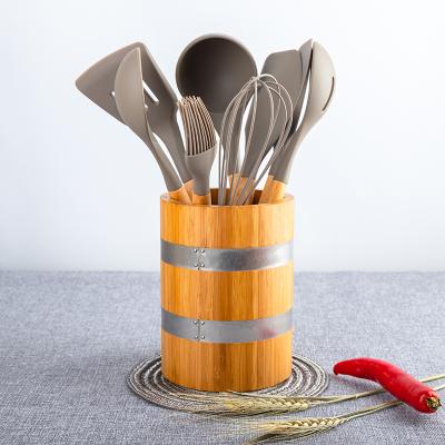 China Hotselling 8PCS Wooden Handle Beech Sustainable Kitchen Silicon Nylon Utensils Set With Rack for sale