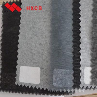 China PA Adhesive Glue Weft Insert Grounding Nonwoven Interlining Adhesive Interfacing Fabric for sale