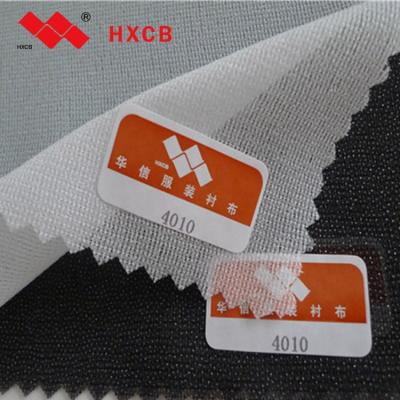 China Adhesive Warp Knitting Woven Fusible Interlining Fabric Working Materials In China for sale