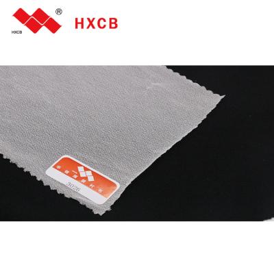 China Adhesive 3026 Polyester Woven Black Fusible Iron On Interlining Interlining Fabric for sale