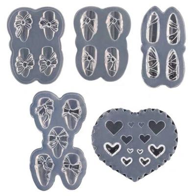 China Handmade Nail Art Bow Love Heart Silicone Mold 3D Nail Carving Mold For Nail Art DIY Decoration for sale