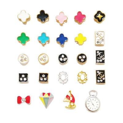 China Factory direct sales fashion design fashion art diy metal rhinestone nail decorations mixed color clover nail 3D alloy nail models for sale