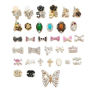 China Fashion Design Factory Direct Sales Color Mounted DIY Metal Rhinestone Art Bow Nail Alloy 3D Nail Mixed Patterns Decorations for sale