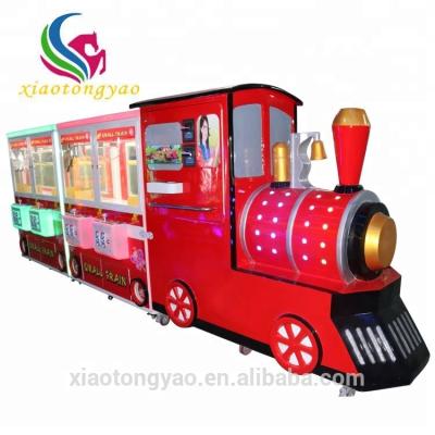 China Hardware 4 Players Gift Crane Machine Red Claw Machine Train Claw Crane Machine Large for sale