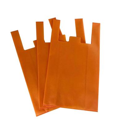 China 100% Eco-friendly Non Woven Eco Carry Out Bags Retail Supermarket Grocery Vest Bags With Handle Food Packaging for sale