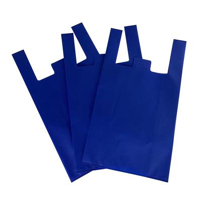 China 100% Eco-friendly Biodegradable Groceries Die Cut Reusable Supermarket Shopping Bag Foldable Non Woven T-shirt Bag for sale