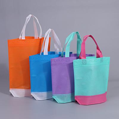 China 100% Eco-friendly Promotional Cheap Non Woven Grocery Bags Colored Shopping Bags for sale