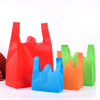 China 100% Eco-friendly Reusable Foldable Shopping Bags Tote Bag Foldable Nonwoven Vests PP Bag With Handle Food Packaging for sale