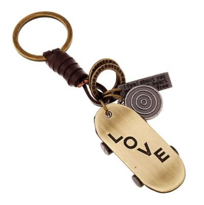 China Wholesale Love Promotion Gift Couples Scooter Couples Key Chain Leather Logo Key Chain for sale