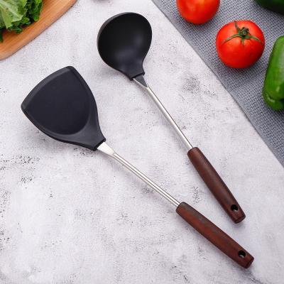 China Sustainable Kitchen Tools Spatula Pot and Scoop Cookware Set Stainless Steel Silicone Head Kitchenware Wooden Handle for sale