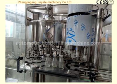 China Touch Screen Automatic Milk Filling Machine With Bottle Neck Holding Transmission Technology for sale