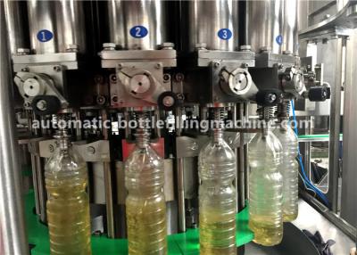 China 3.5Kw Rotary Sealing Sunflower Auto Oil Filling Machine 5000BPH for sale