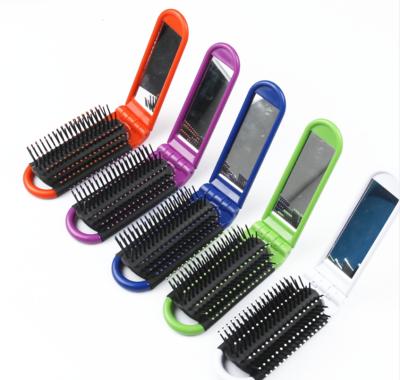 China Travel Gift Specialty Folding Noise Portable Folding Hair Brush with Mirror Pocket Compact Hair Comb COMB001 for sale