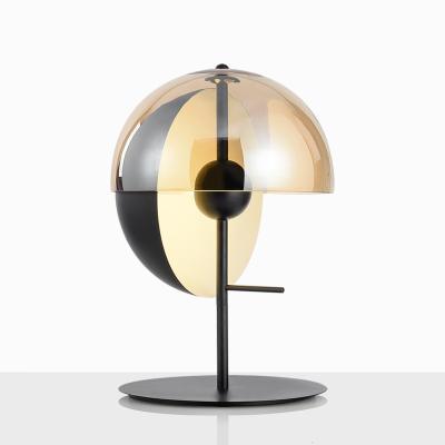 China Modern Round Shape Metal Base Hotel Sphere Clear Amber Glass Table Lamp for sale