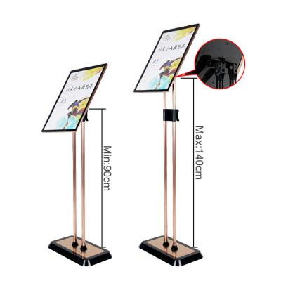 China Height Adjustable Floor Position Poster Displays Adjustable Revolving Sign Holder A4 A3 A2 Metal Poster Rack For Holding Menu for sale