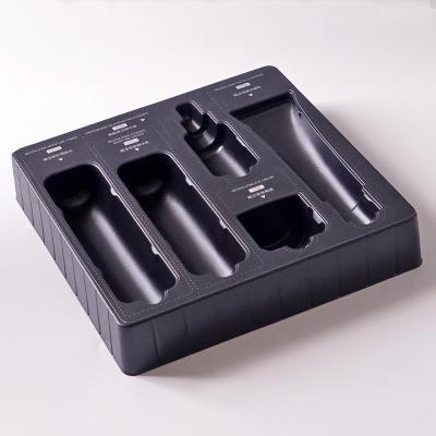 China Custom Cosmetic Blister Insert Tray Plastic PET Clear Black Packaging Tray For Cosmetic Skin Care Sets for sale