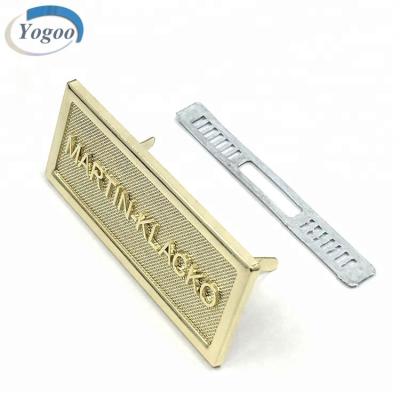 China No Fade High Quality Custom Light Gold Metal Letter Embossed Tag Bag Plates for sale