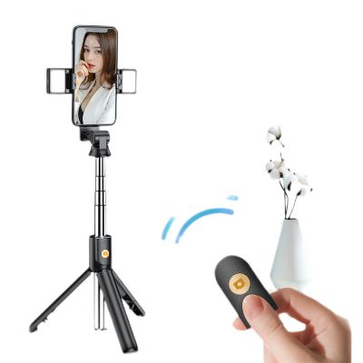 China Mini Fold Selfie Stick Tripod K12 Extendable Stick Tripod With Detachable Exterior For Phones Selfie Smart Phone Holder for sale