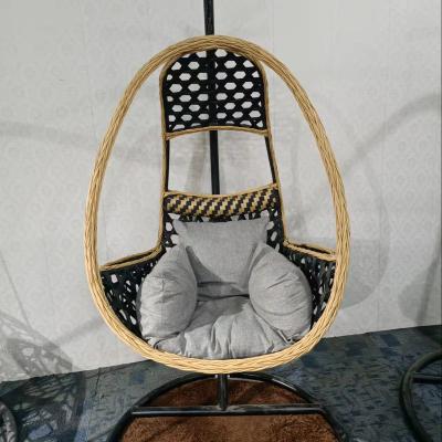 China Super Comfortable Hotel Outdoor Rattan Patio Rattan Swing Egg Hanging Chair With Stand Patio Swing Chair for sale