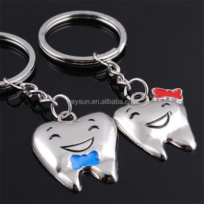 China  Classic Cartoon Teeth Keychain Dentist Decoration Key Chains Stainless Steel Tooth Model Shape Dental Clinic Gift for sale