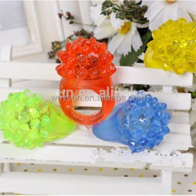 China Cool Led Light Up Ring Rave Party Blinking Soft Jelly Glow Bubble Party Favor ZQ100509 for sale