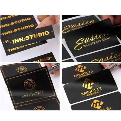 China Custom black CMYK gold foil art paper gold foil logo sticker private label for packaging for sale