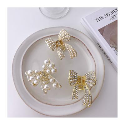 China Fashion Dropshipping Big Metal Gold Pearl Butterfly Hair Claw Clip Hair Clips Claw Clip for sale