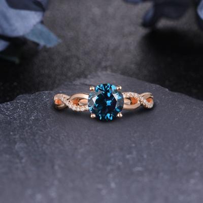 China 14k London Fashion Jewelry 2021 Romantic Blue Design Topaz Engagement Ring Wedding Ring Solid Gold Round Cut 2.0Ct New For Women for sale