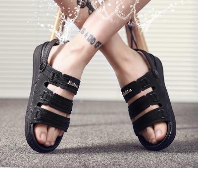 China Anti-Smell Beach EVA Cross Men Freeze Clog Shoes Mens Casual Sandals Pure Black Clogs Shoes for sale