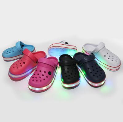 China Anti-odor 2019 New Spring Factory Children EVA LED Light Clogs Kids Shape Luminous Sandals For Infant Girls Boys Baby Fluorescent Shoes for sale