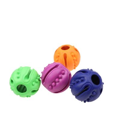 China Custom Multifunctional Pet Molar Bite Dog Leakage Food Rubber Stocked Toy for sale