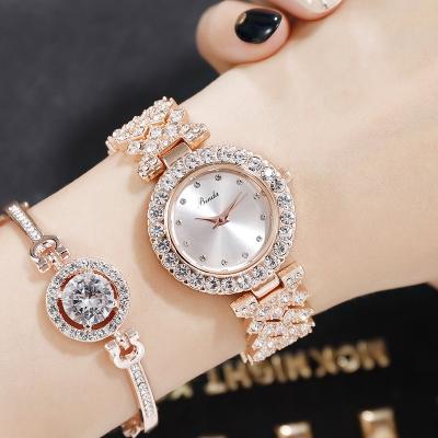 China Non-specific bracelets and classic LOGO wholesale custom fashion jewelry women quartz watches set for ladies for sale