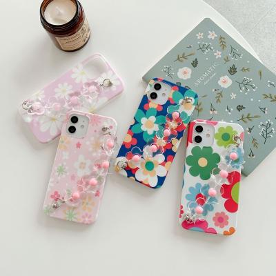 China New Fashion Shockproof Flower Phone Case With Wrist Strap For iPhone 13 12 11 pro X max XR XS 7 8 max plus Fundas for sale