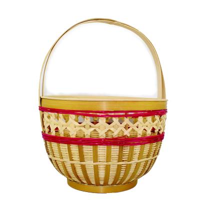 China Sustainable Handwoven Wicker Flower Basket Eco-Friendly Rattan Fruit Basket Handmade Storage Baskets for sale