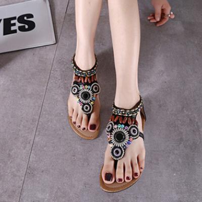 China Summer new fashion ethnic style flat sandals hot selling Bohemian comfortable light slippers hollow women shoes for sale