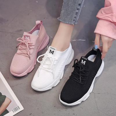 China 2022 new flying woven mesh sneakers women fashion casual shoes running wholesale soft sole Walking Style Shoes for sale