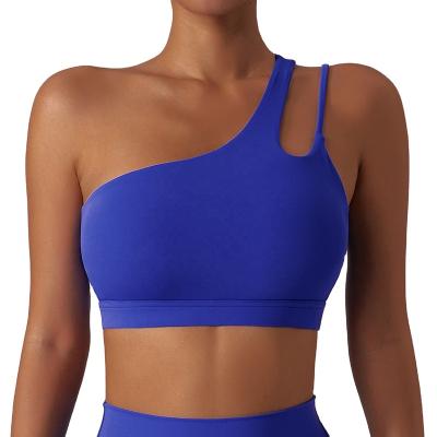 China Breathable 2023 Women Soft Oblique Cut Out Yoga Shockproof Backless Padded One Shoulder Sports Bra With Cloud Sensation Fabric for sale