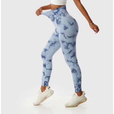 China Breathable MEISU Tie Dye high-waisted yoga pants women's smiling peach hip-lifting sports leggings running fitness pants for sale