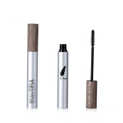 China Large Volume Empty Aluminum Cosmetics 8ml 10ml 12ml Mascara Tube/Pack/Container/Bottle With Wood Grain Lid And Matte Silver Base for sale