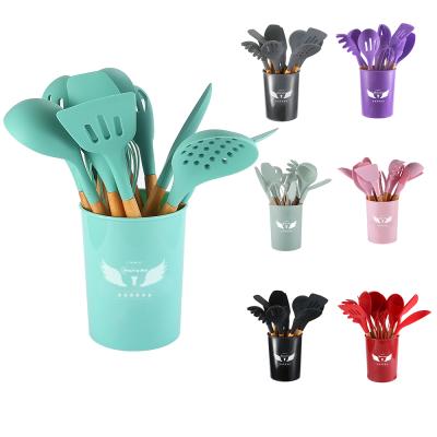 China Sustainable 13 PCS Cookware Set With Wooden Hand Rack Eco-friendly Spatula Set Silicone Kitchen Gadgets for sale