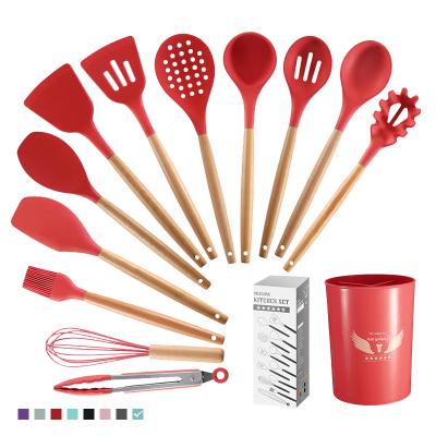 China Easy To Clean 13 PCS Red Silicone Non-Stick BPA Free Safe Non-Toxic Cookware Set Set With Wooden Bamboo Handles for sale