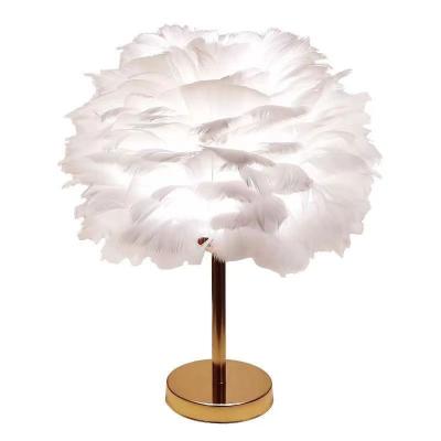 China Bedside Bedroom Lamp Modern Simple Creative Modern Creative Feather Table Lamp Feather Wedding Decorative Lamp Warm And Romantic for sale