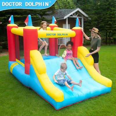 China Multifunctional Doctor Dolphin Kids Playground Toys Blow Up Inflatable Slide Bounce House Jumping White Air Castle for sale