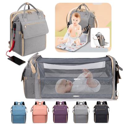 China With USB Outdoor Travel Diaper Bag Baby Backpack With Changing Folding Chair Seat Pad USB Charging Port for sale